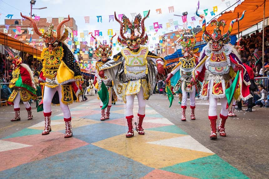 People wearing devil masks at Oruro carnival parade