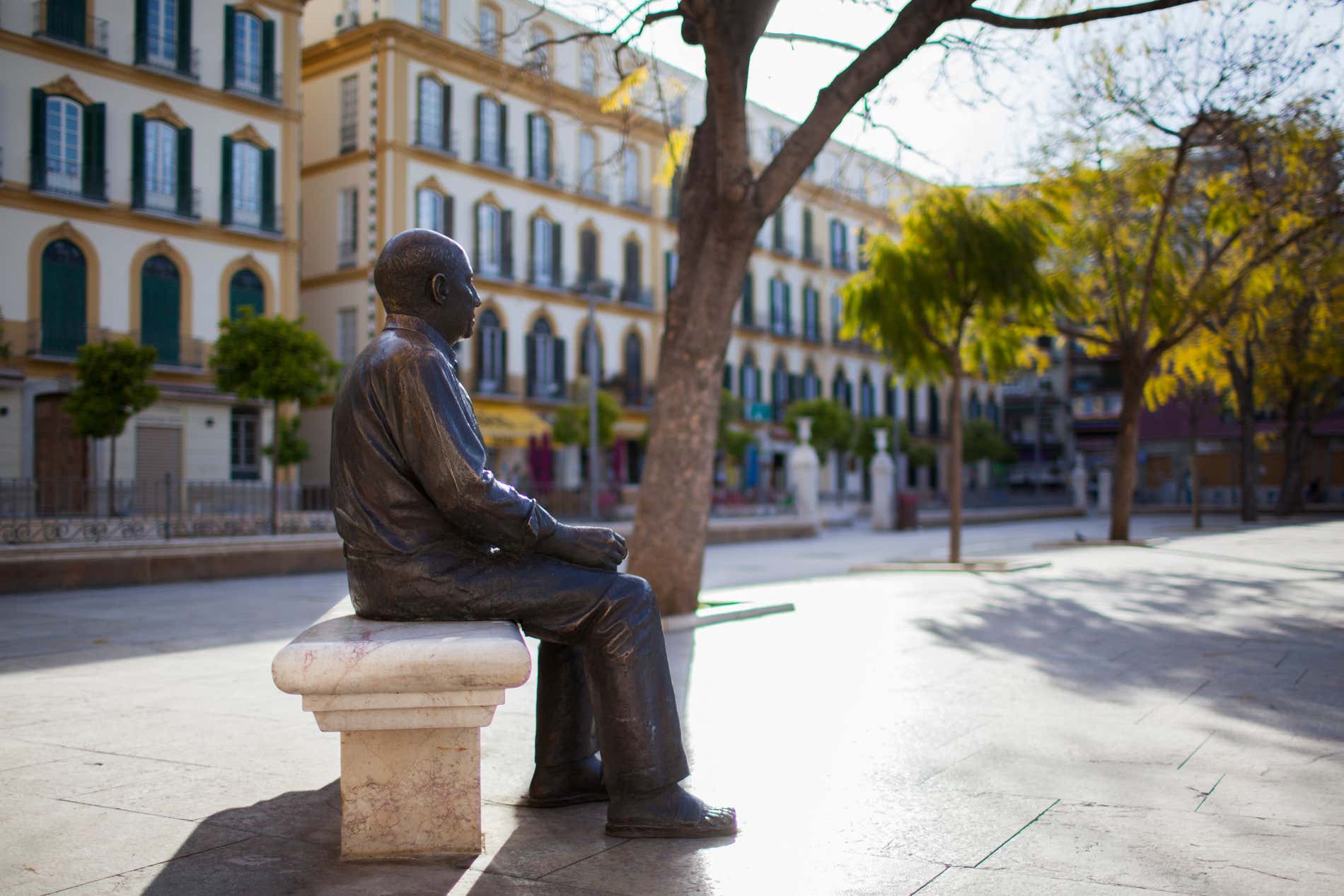 A photo of the statue of Pablo Picasso in Plaza de la Merced in Malaga