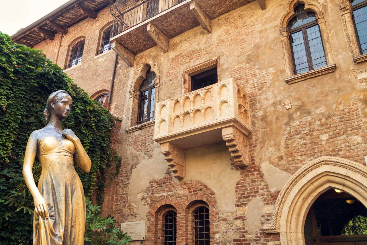 A bronze statue of Juliet outside of Juliet's House in Verona.