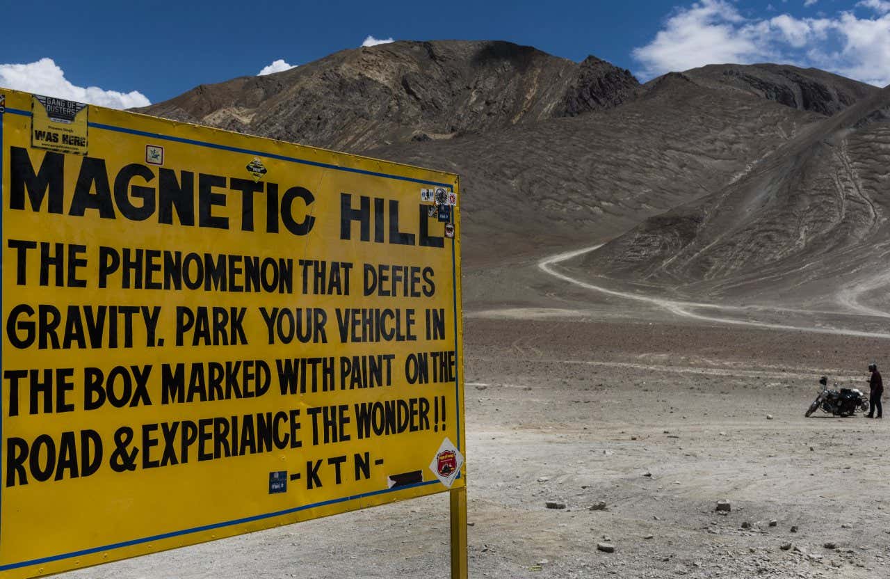 A sign at Magnetic Hill in Ladakh, India describing the anti-gravity hill.