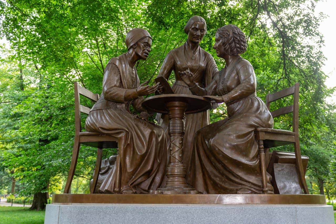 A statue depicting 3 women's rights pioneers Sojourner Truth, Susan B. Anthony, and Elizabeth Cady Stanton.