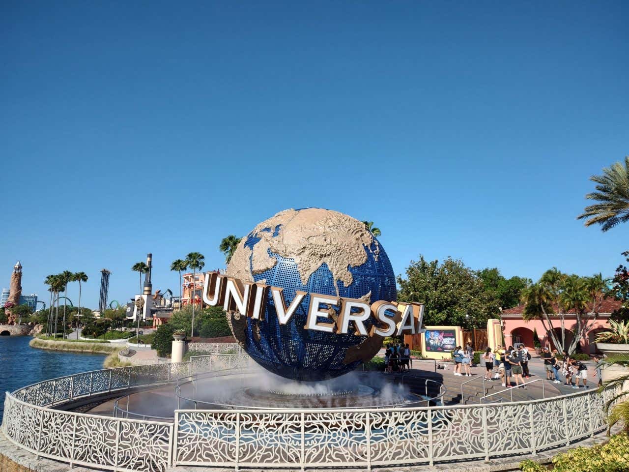 Universal Orlando Resort globe with a clear blue sky in the background.