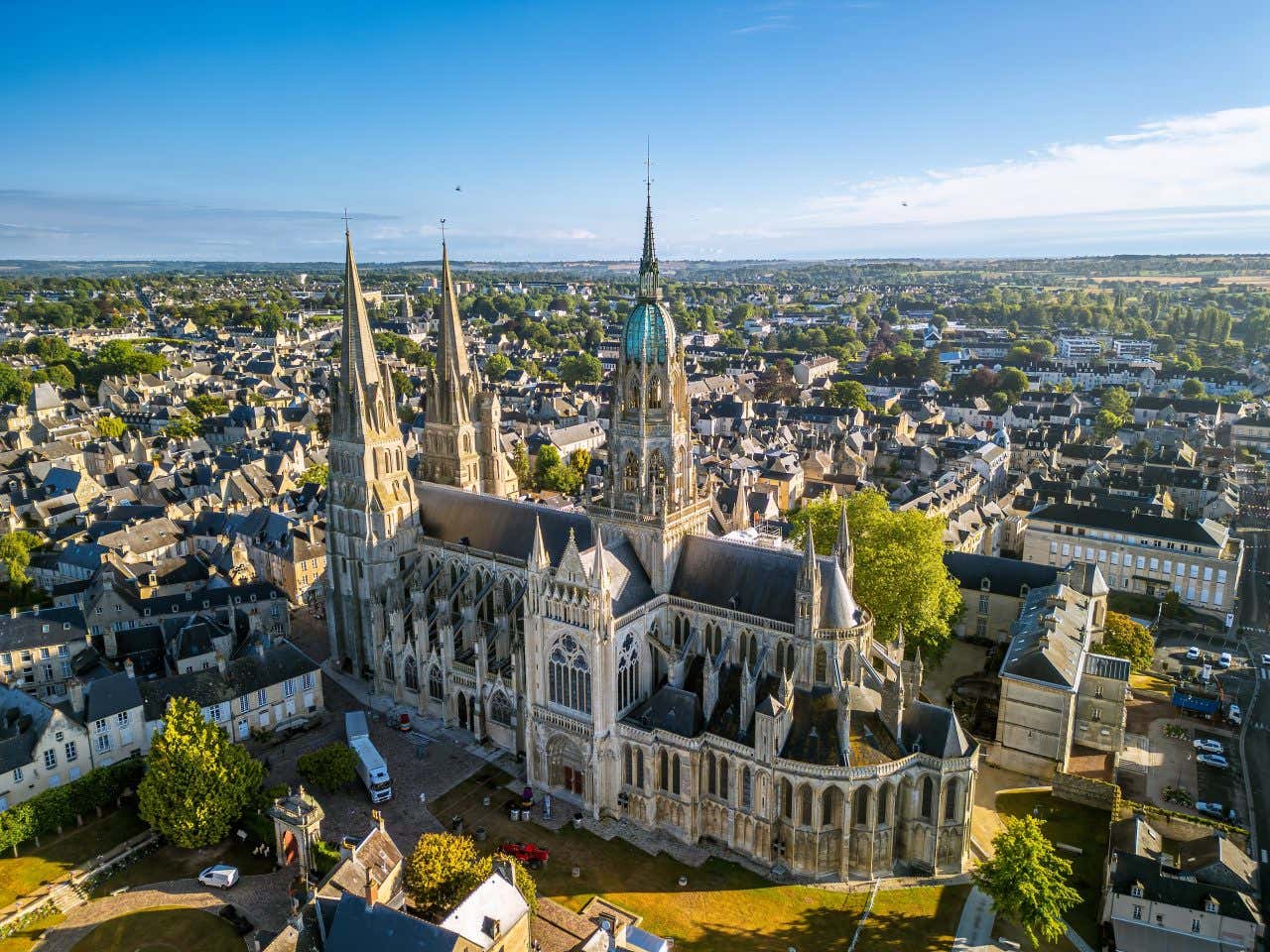 Aerial view of the Bayeux Cathedral dominating the town of Bayeux's skyline on a sunny day