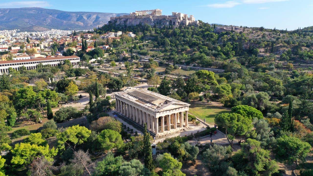 The Agora of Ancient Athens seen from above, with the Temple of Hephaestus in the center of the image and the Acropolis in the background.