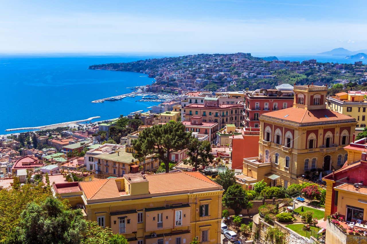 A view of the city of Naples, with the Gulf of Naples seen, from a hill on a clear day.