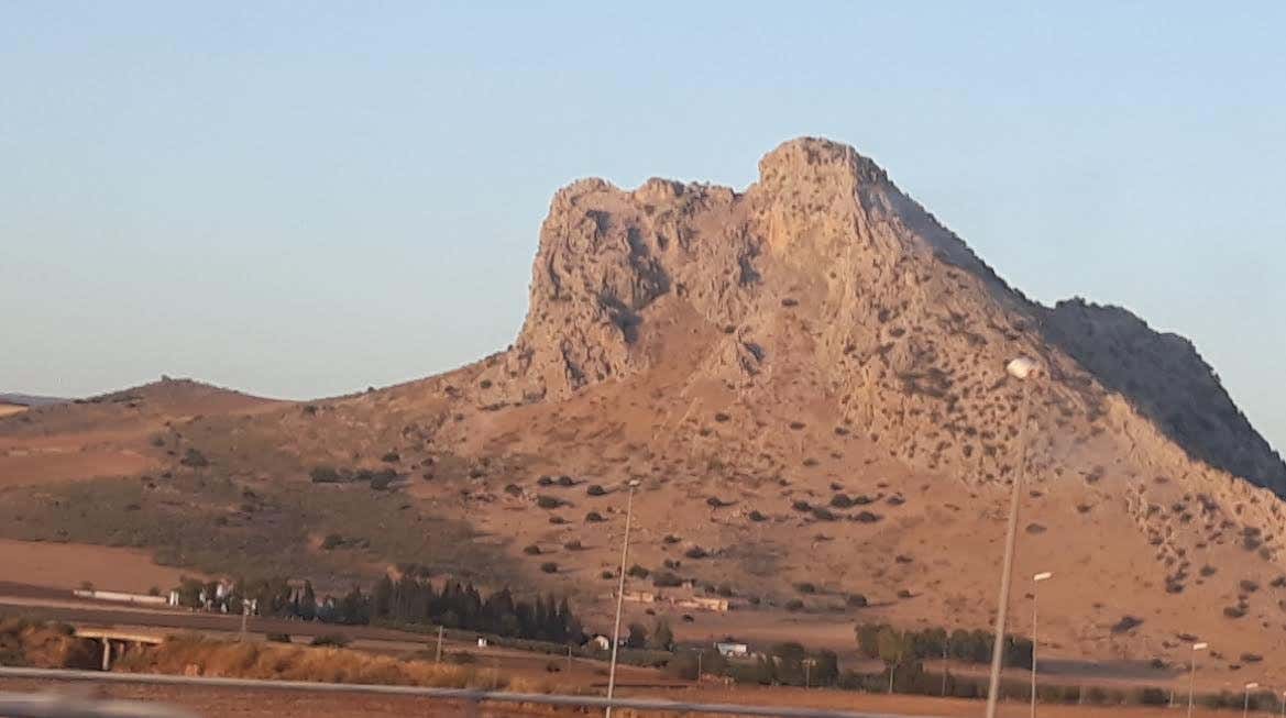The Peña de los Enamorados mountain, resembling a sleeping giant, near the town of Antequera