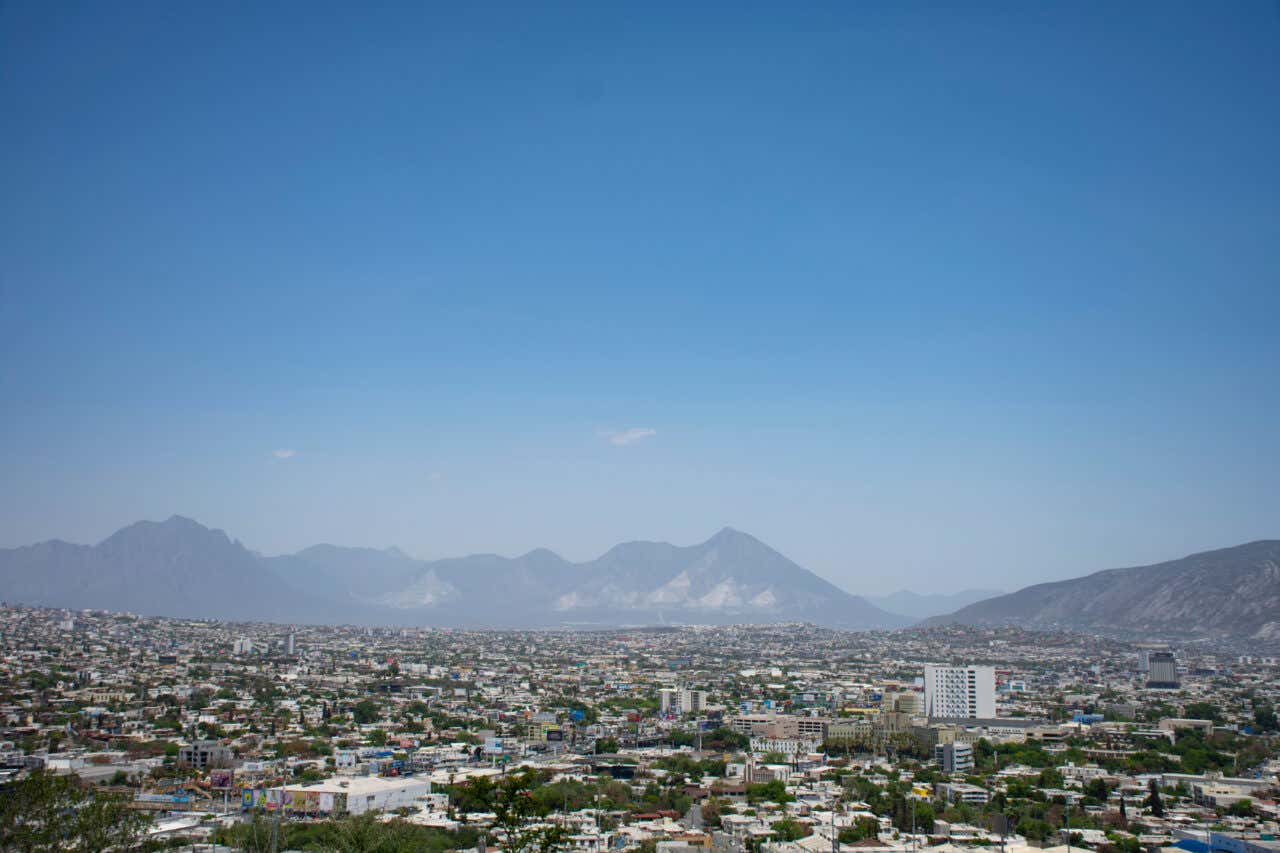 Views from the Cerro del Obispado viewpoint, looking over the city with the mountains in the background and a clear sky.