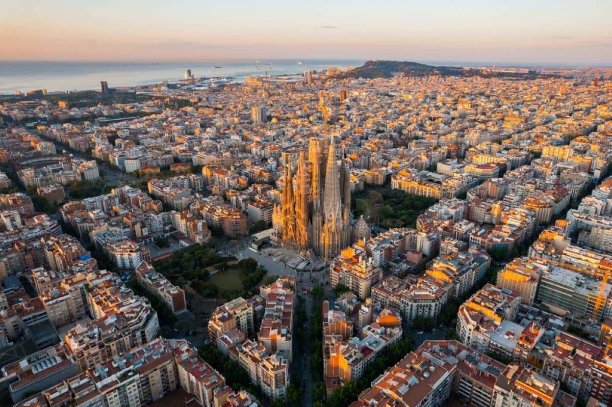 Aerial view of Barcelona with the Sagrada Família in the center.
