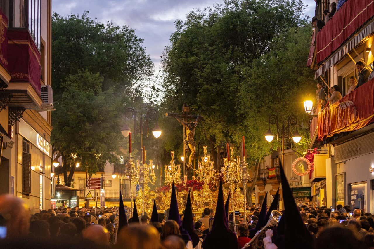 Easter Holy Week parade in the early hours of Good Friday morning in Seville, Spain.