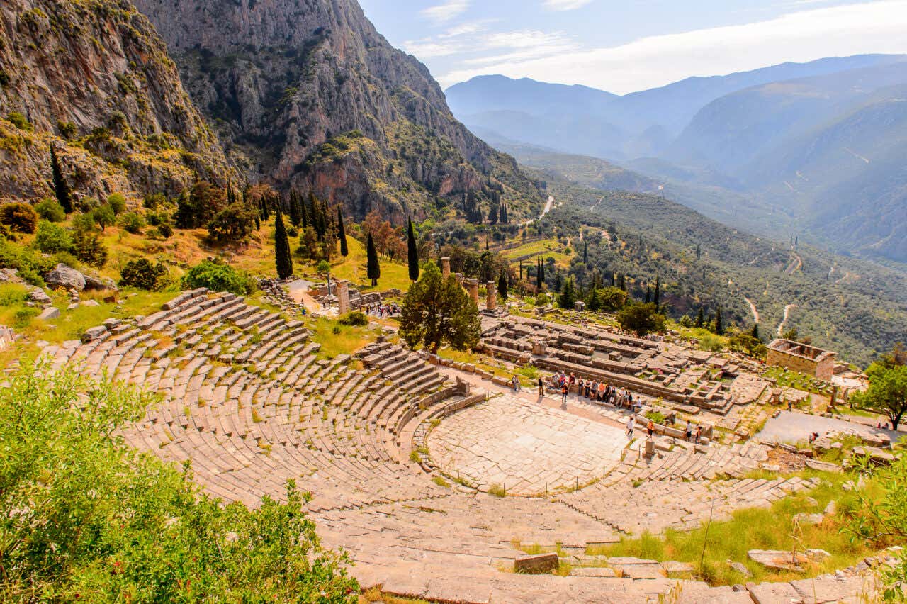 The theatre in Delphi with clouds in the background.
