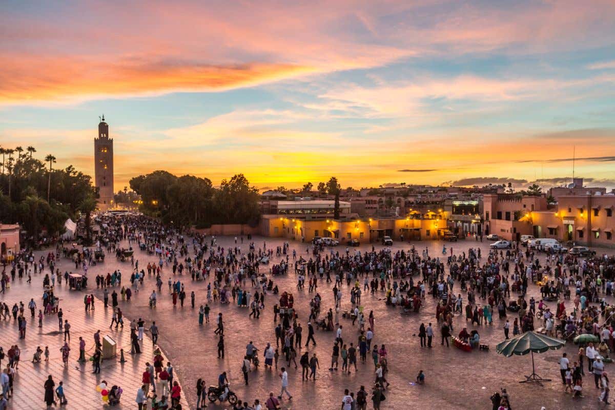The lively Jemaa el-Fnaa square in Marrakech at sunset.