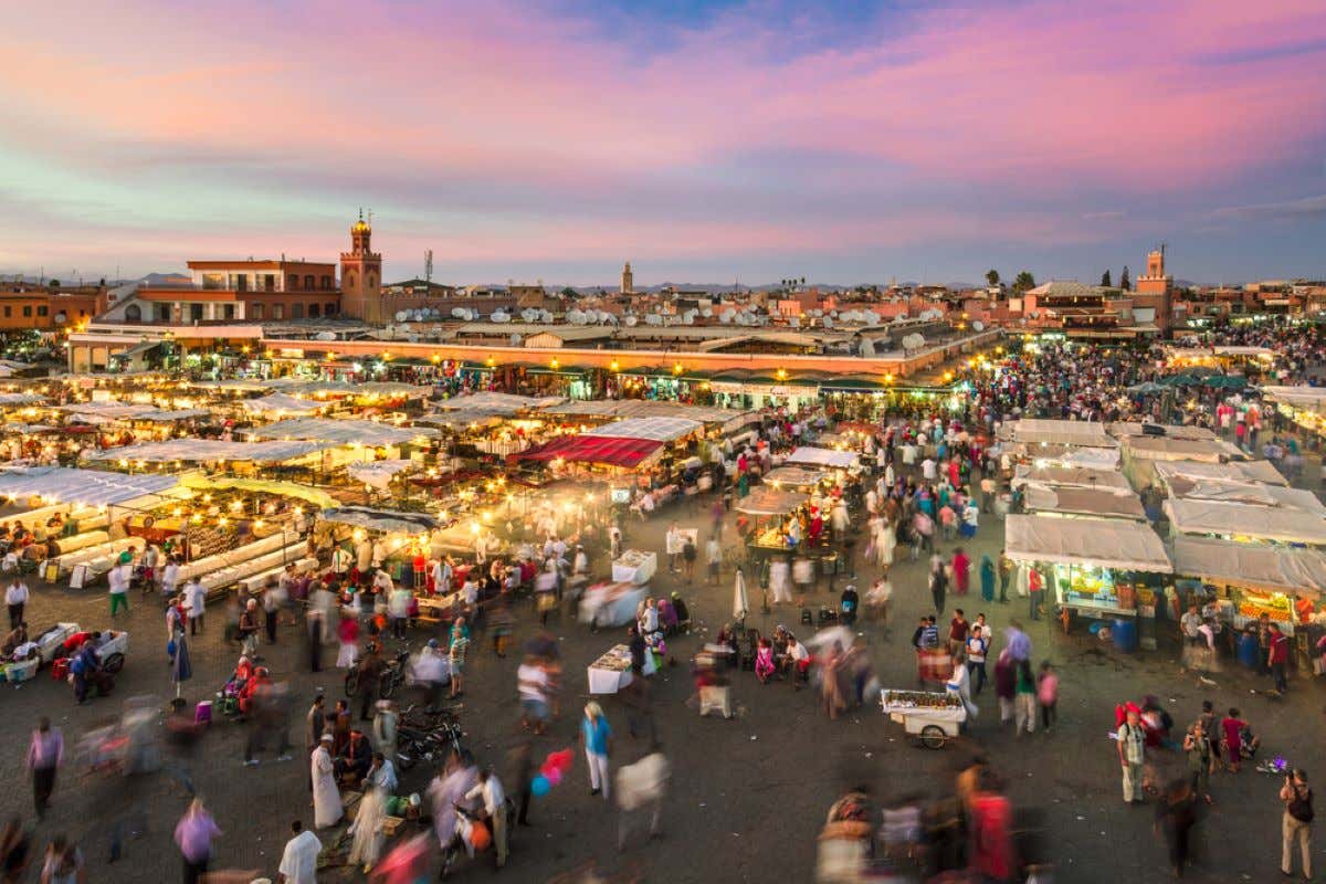 The lively Jemaa el-Fnaa square in Marrakech in the evening