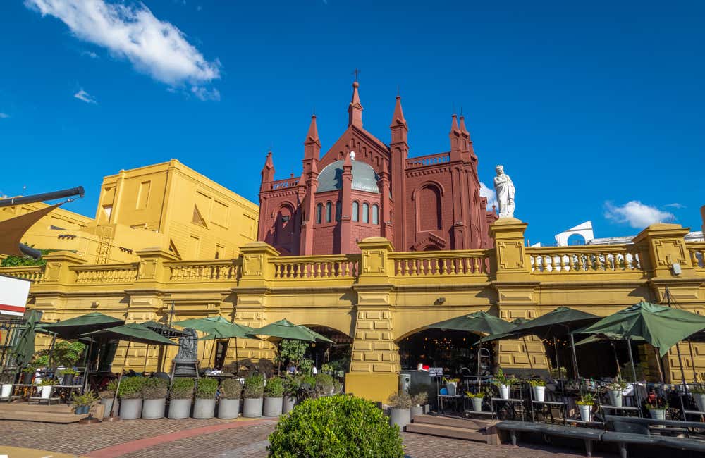 Pink and yellow facade of the Centro Cultural Recoleta in Buenos Aires
