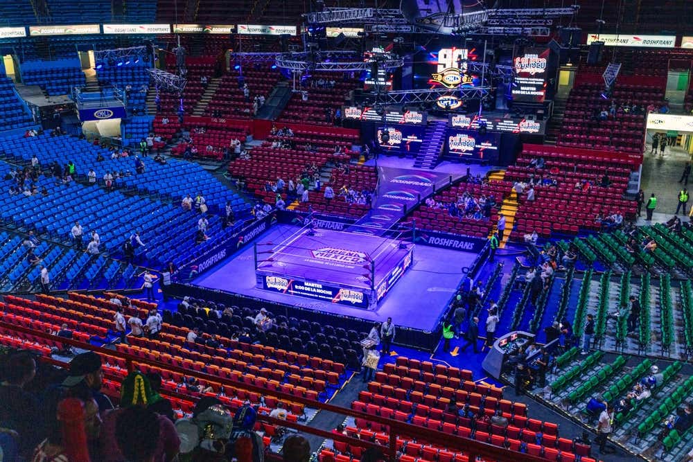 A shot of the ring in the Arena México prior to a Lucha Libre event with some punters beginning to find their seats.