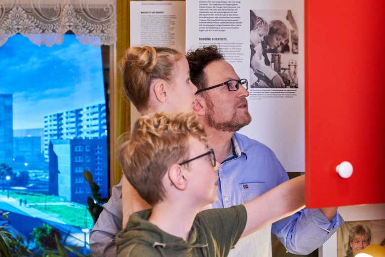 A family exploring the DDR Museum