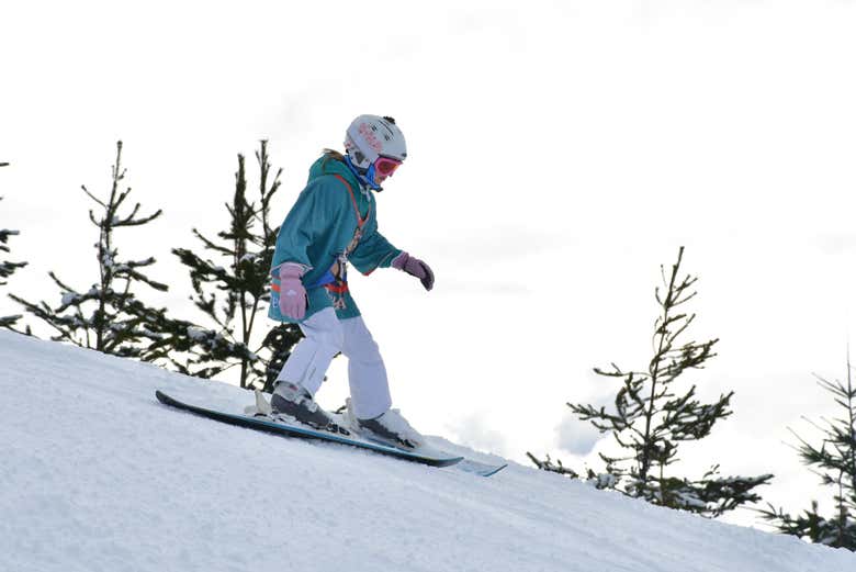 Haciendo snowboard en Cerro Catedral