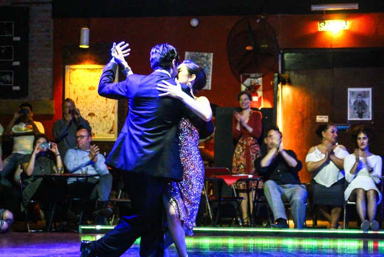 Dancing tango in a milonga