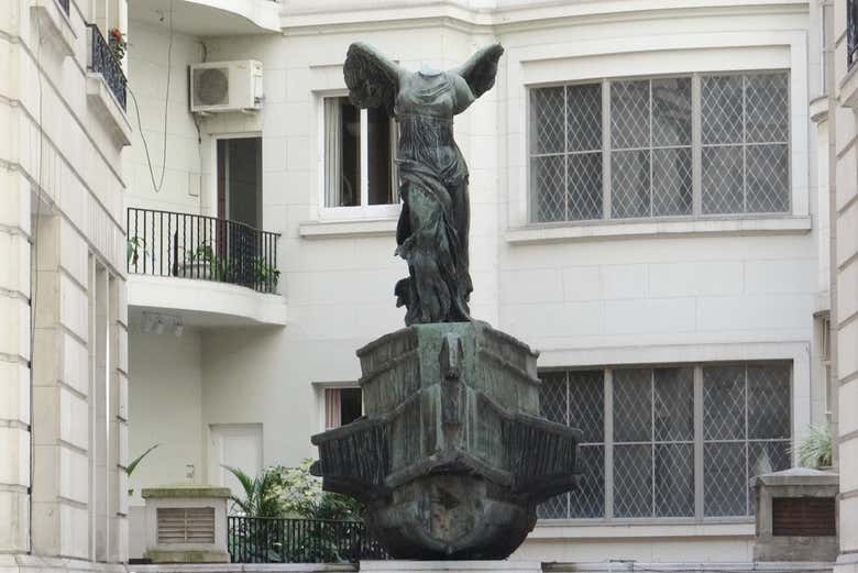 Winged Victory of Samothrace statue in the Estrugamou Building