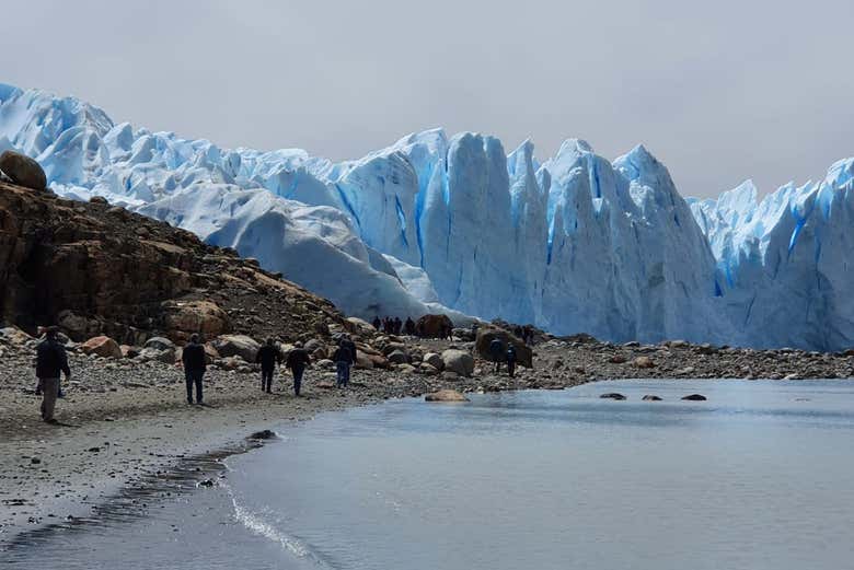 Stroll along Perito Moreno's coastline