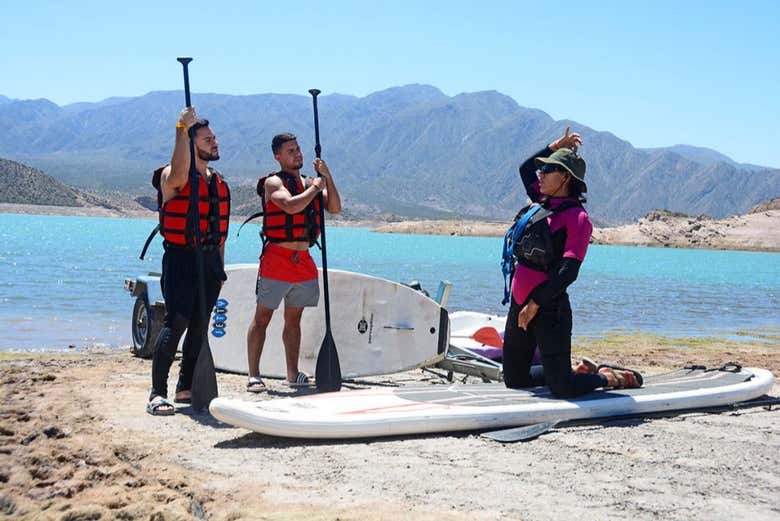 Learning how to paddle surf