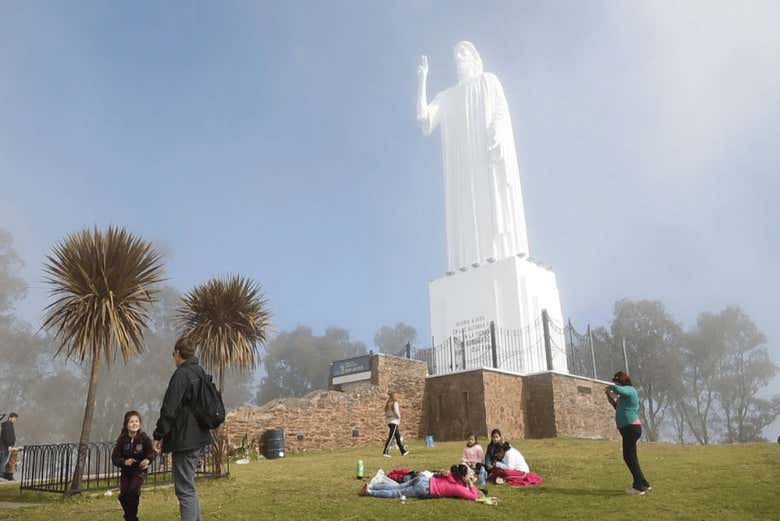 Marvel at the massive statue of the Blessed Christ
