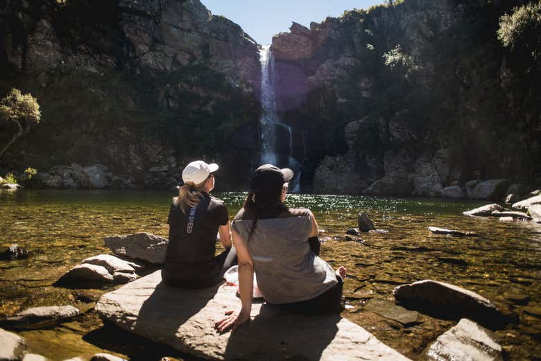 Relaxing and admiring the waterfall