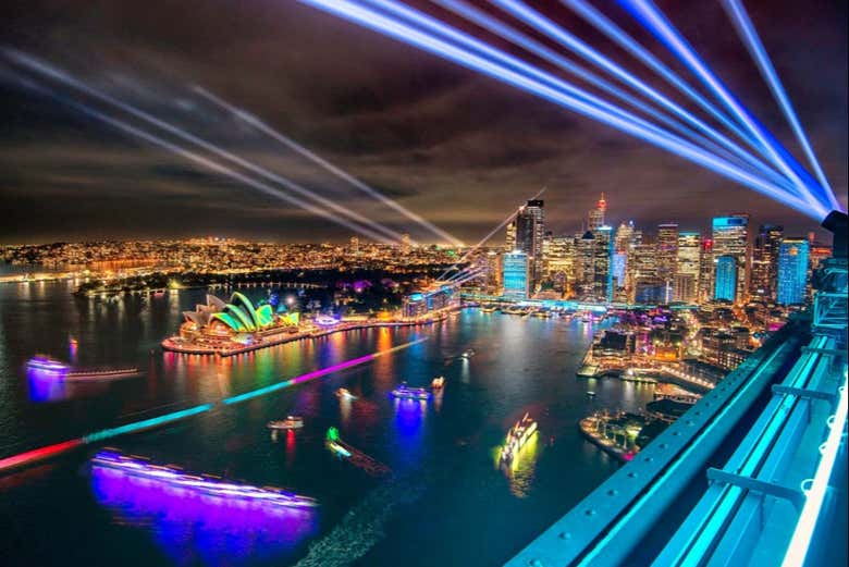 Admire the surrounding buildings lit up at night