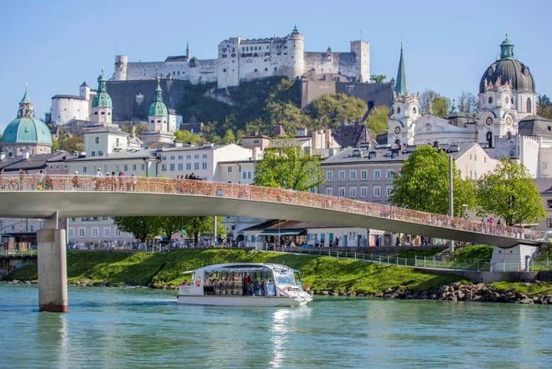 Passing through the center of Salzburg by boat