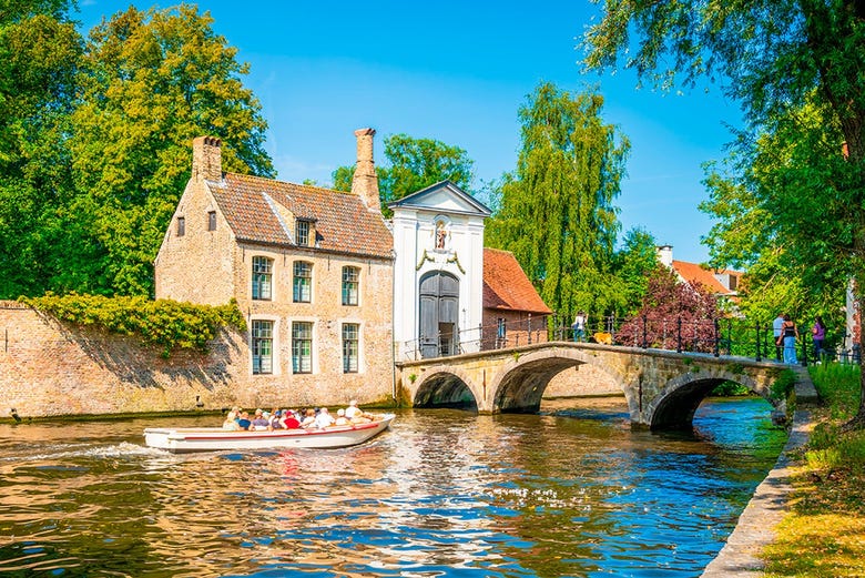 Enjoying a boat ride through Bruges