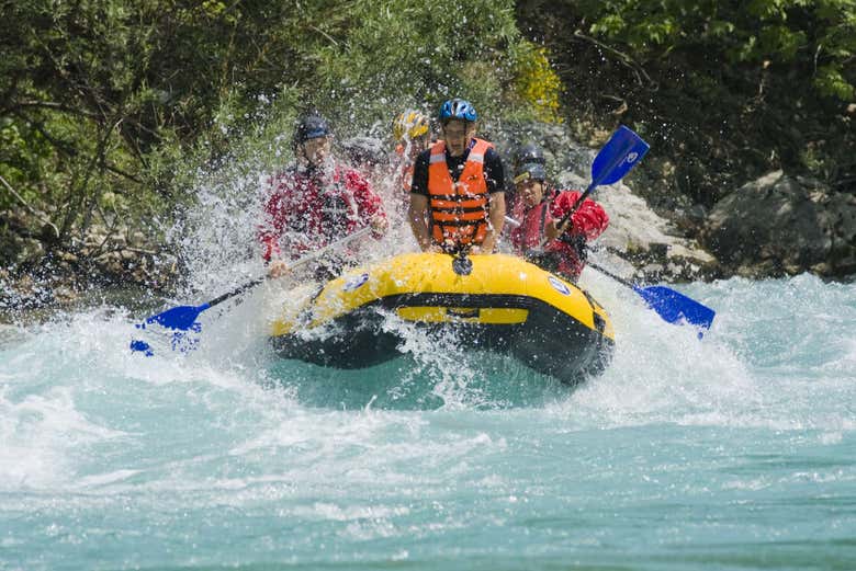 A family enjoying the river rafting activity