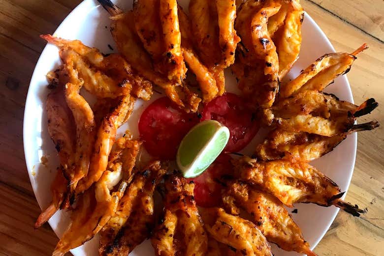 Try regional dishes after exploring lagoons in the area