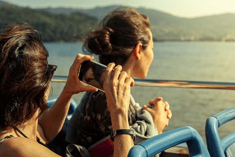 Take pictures from the open-top bus