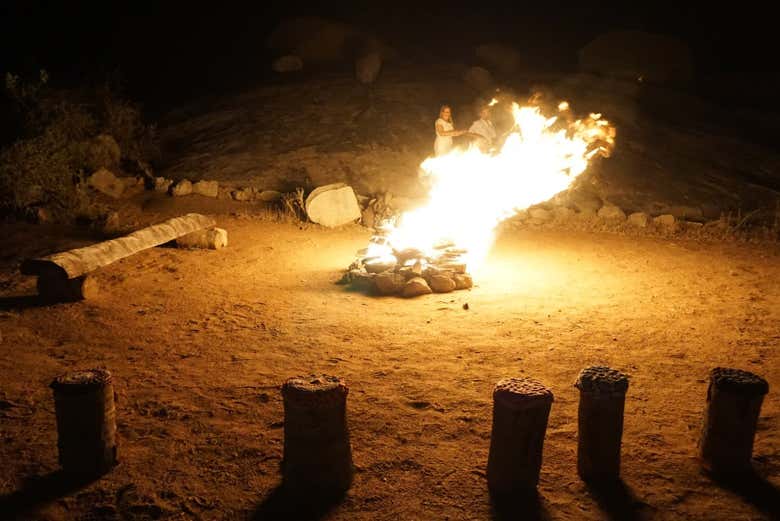 Sit by the bonfire after a day of hiking