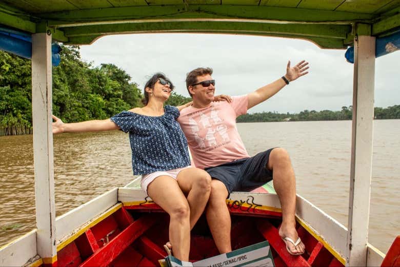 A couple enjoying the boat ride on the Amazon River