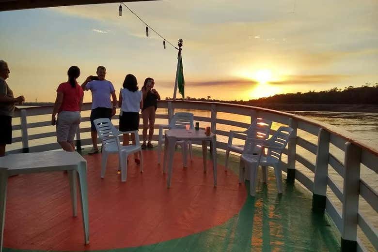 Admire the sunset from the boat
