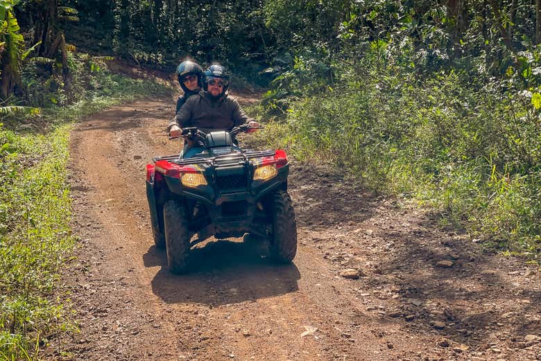 Quad biking down a dirt road