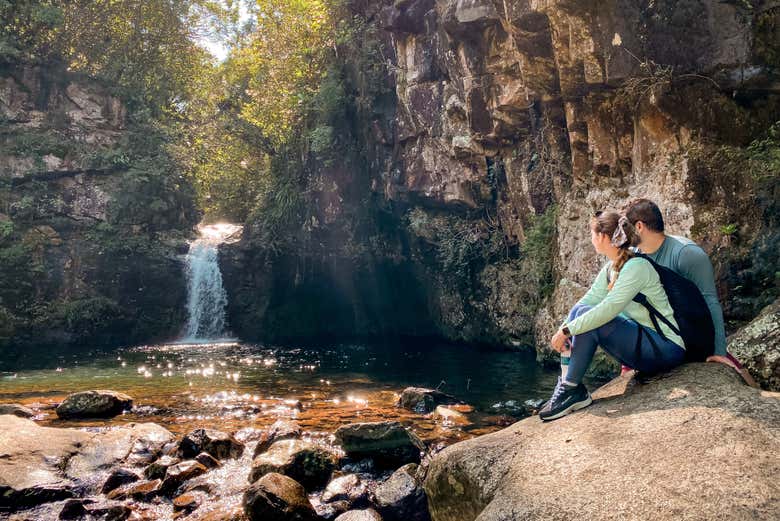 Enjoying the waterfalls of Praia Grande
