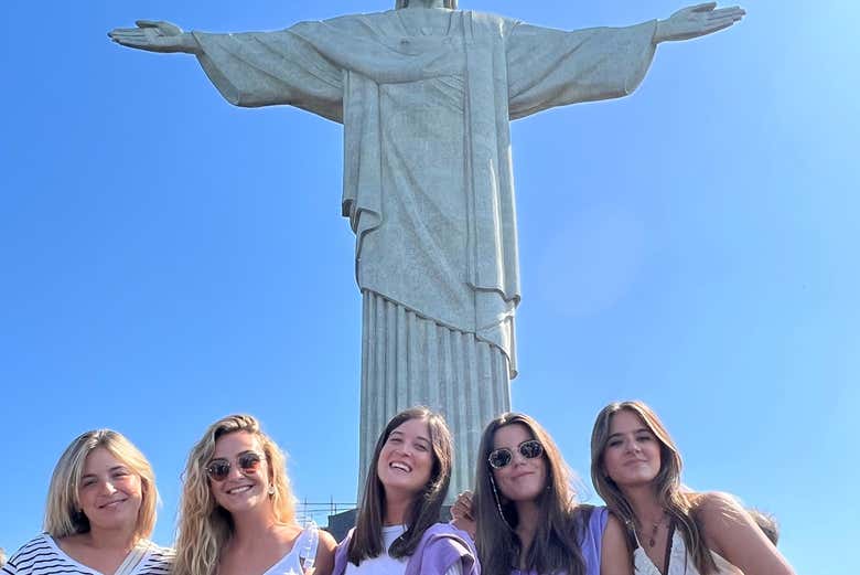 A group of friends next to the Christ the Redeemer