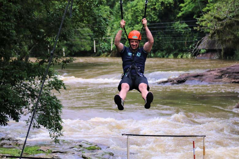 Crossing the Paranhana River by zip line