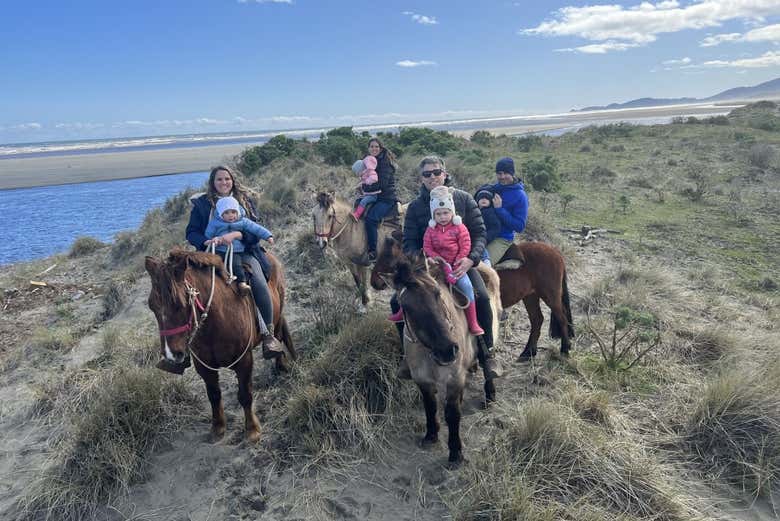 Posando para foto com os cavalos