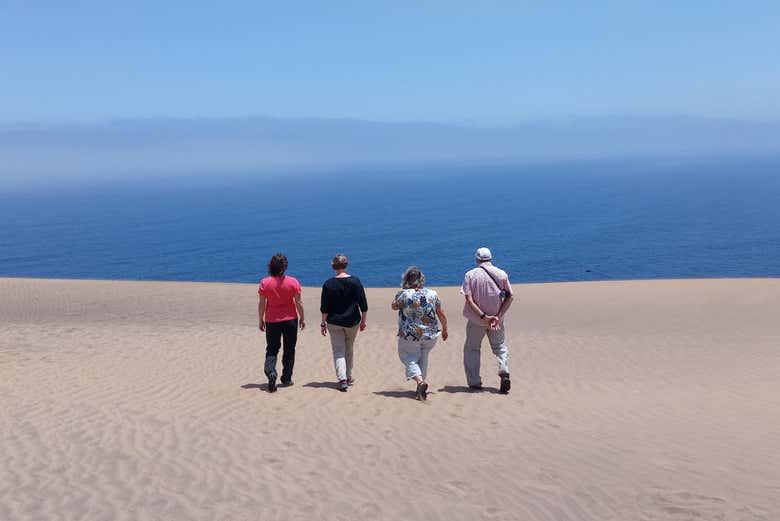 Enjoying a hike through the sand dunes of Concón