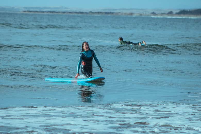 Enjoying a surfing lesson in Concón