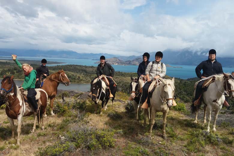 Group of riders by the lake