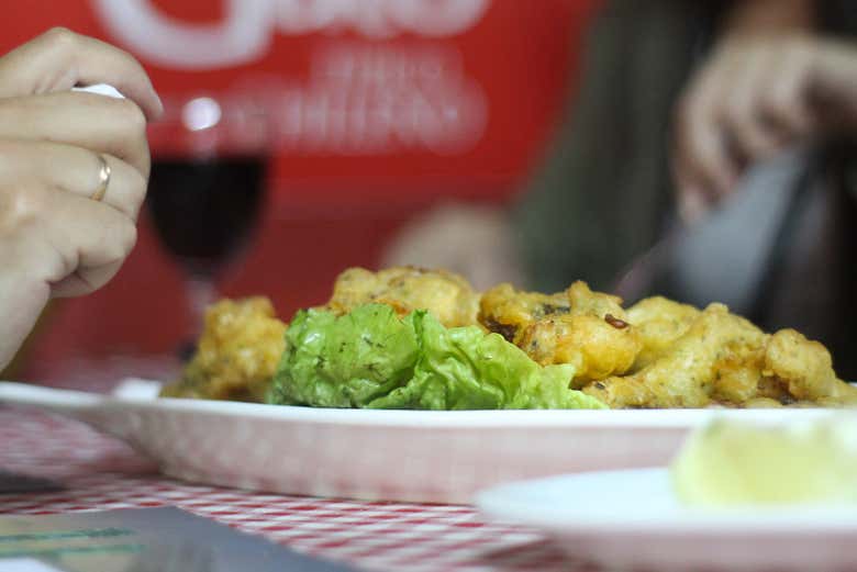 Enjoy a dish of calugas de pescado