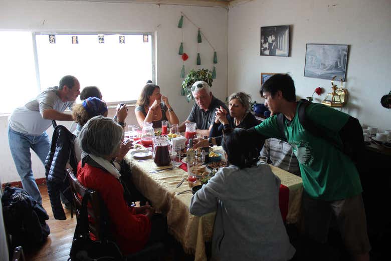 Eating in the home of a local family