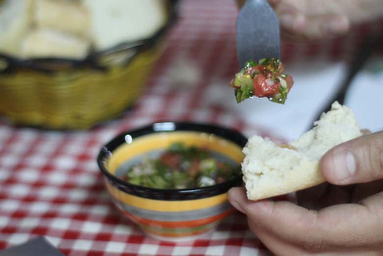 Try a typical dish, the pobre chileno