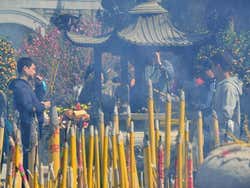 Burning incense at Po Lin Monastery