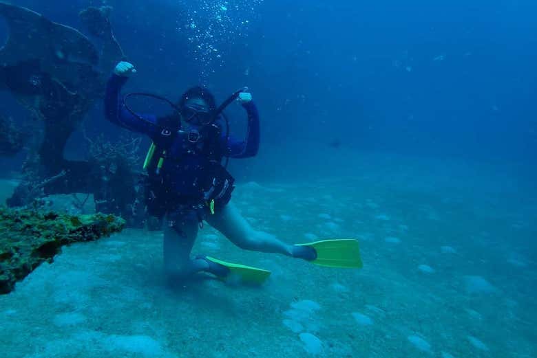 Posing for a photo under the sea