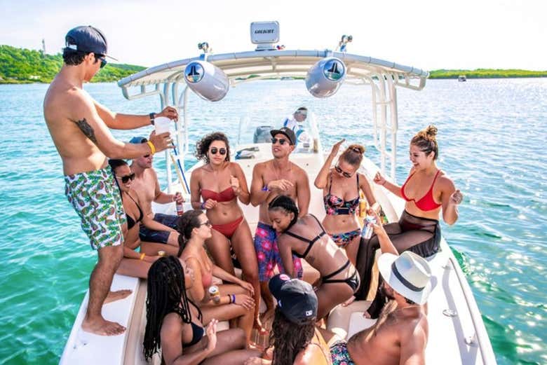Enjoy a party on the boat ride to Tierra Bomba