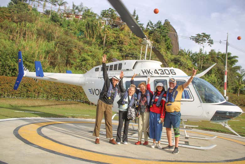 A family about to start the helicopter ride